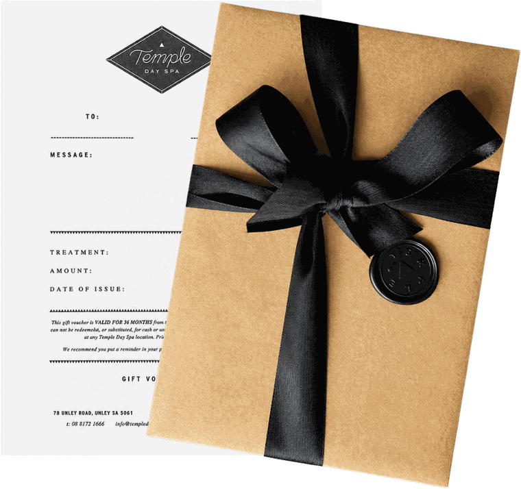 Temple Day Spa gift voucher in its kraft envelope with black ribbon